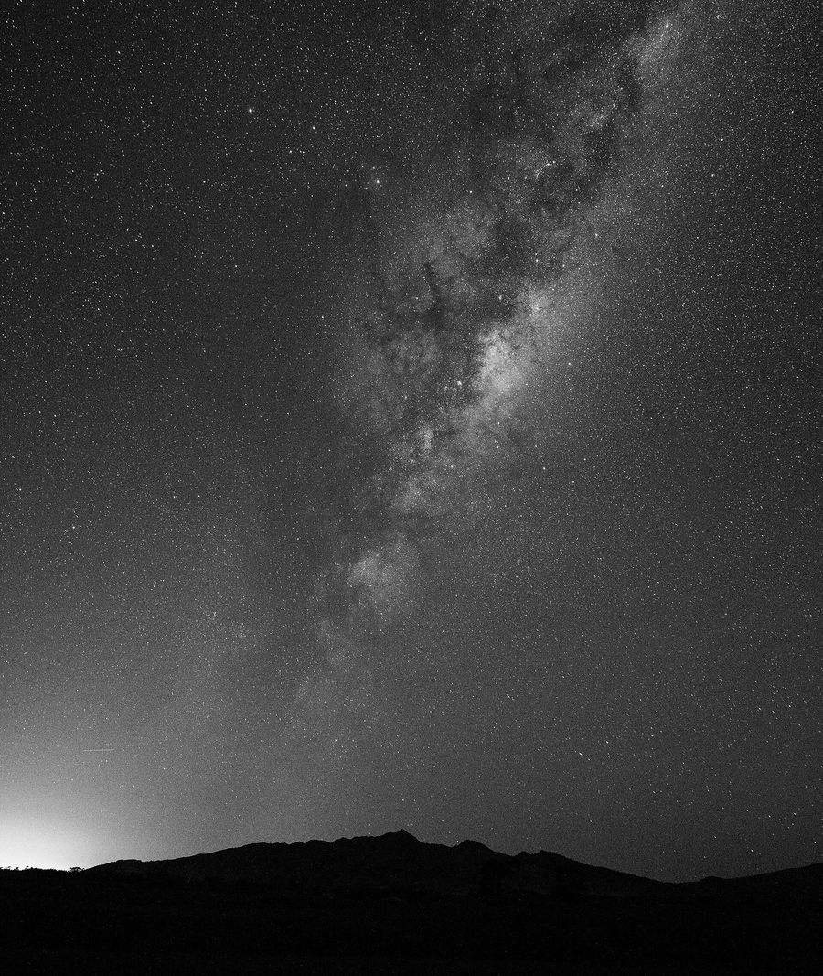 The Milky Way rising above the dark outline of the Kaitake Range in Taranaki